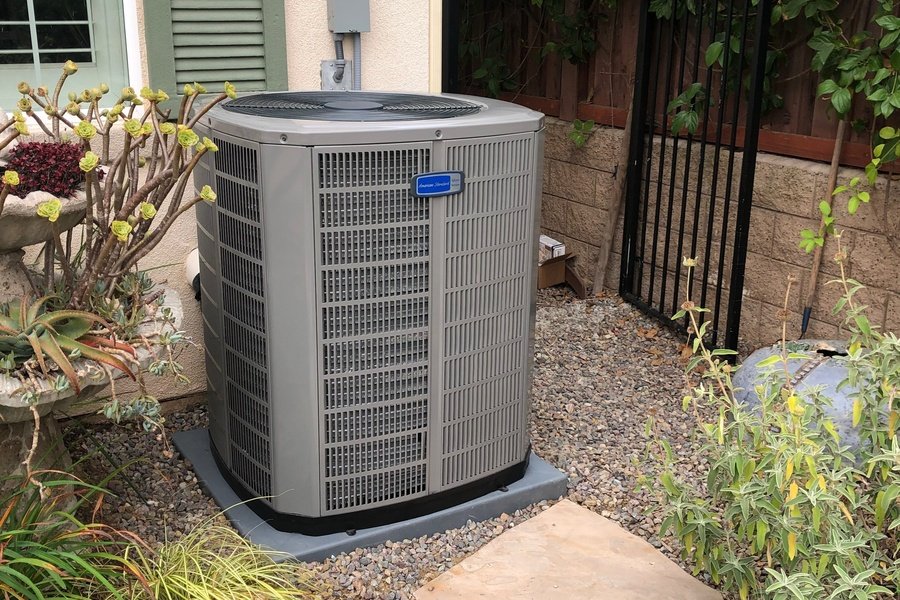 Newly installed energy-efficient air conditioning condenser for a residential home in San Diego, CA.